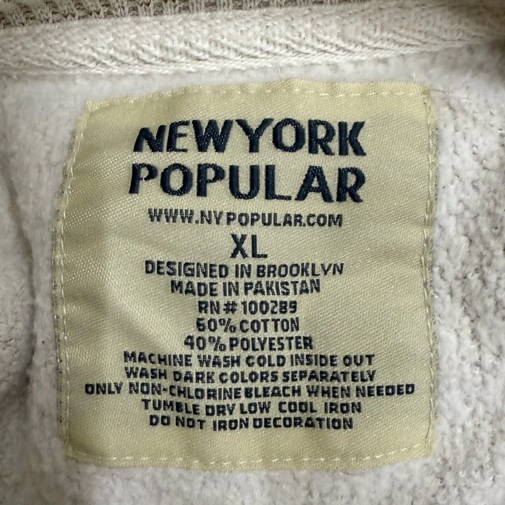 Cream Sweater by New York Popular